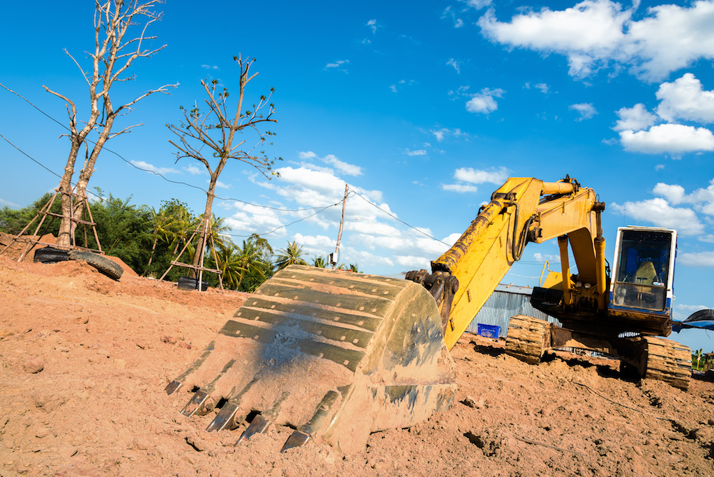 Old excavator on a construction site